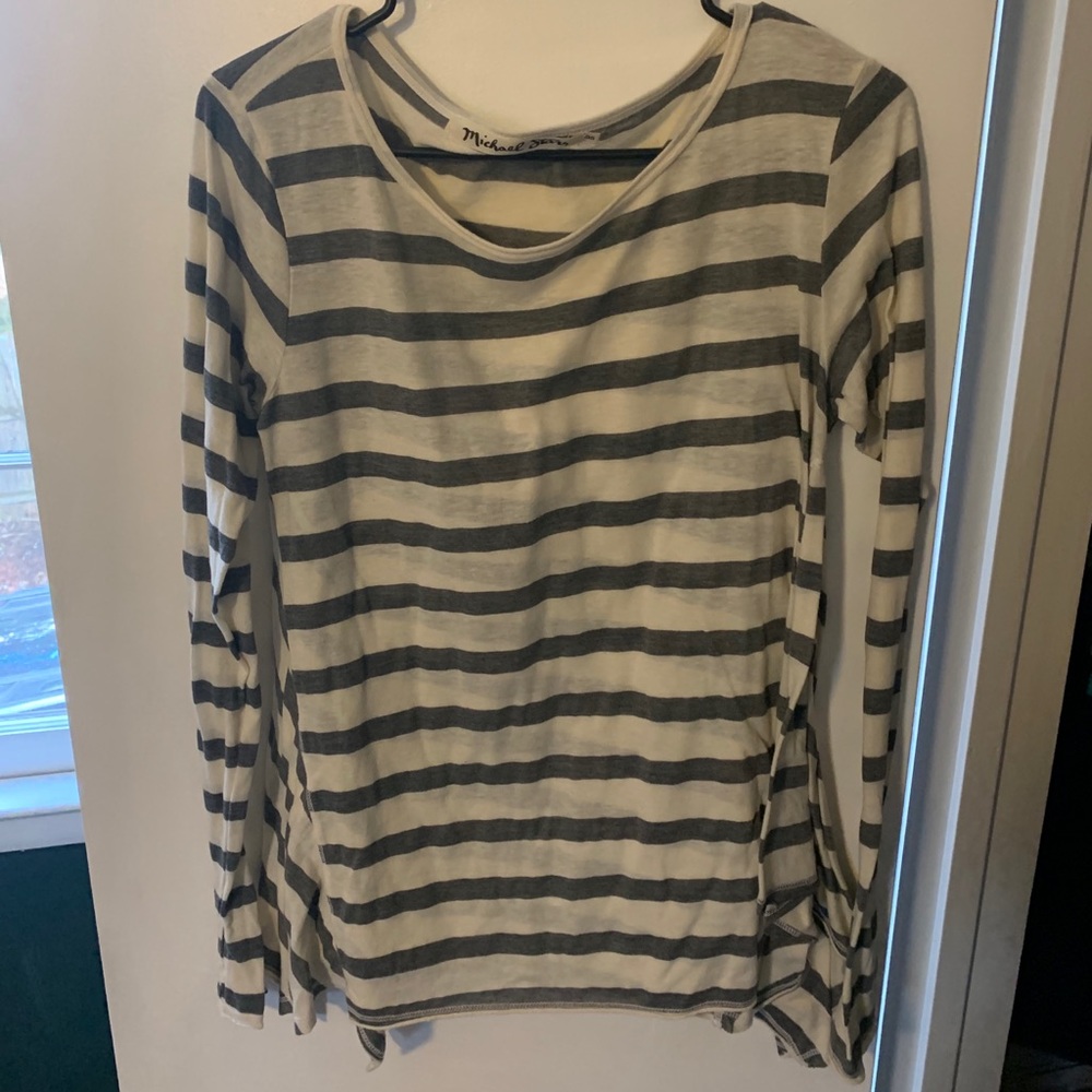 Grey and white striped long sleeve shirt.